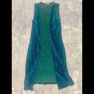 A small blue duster vest from Earthbound